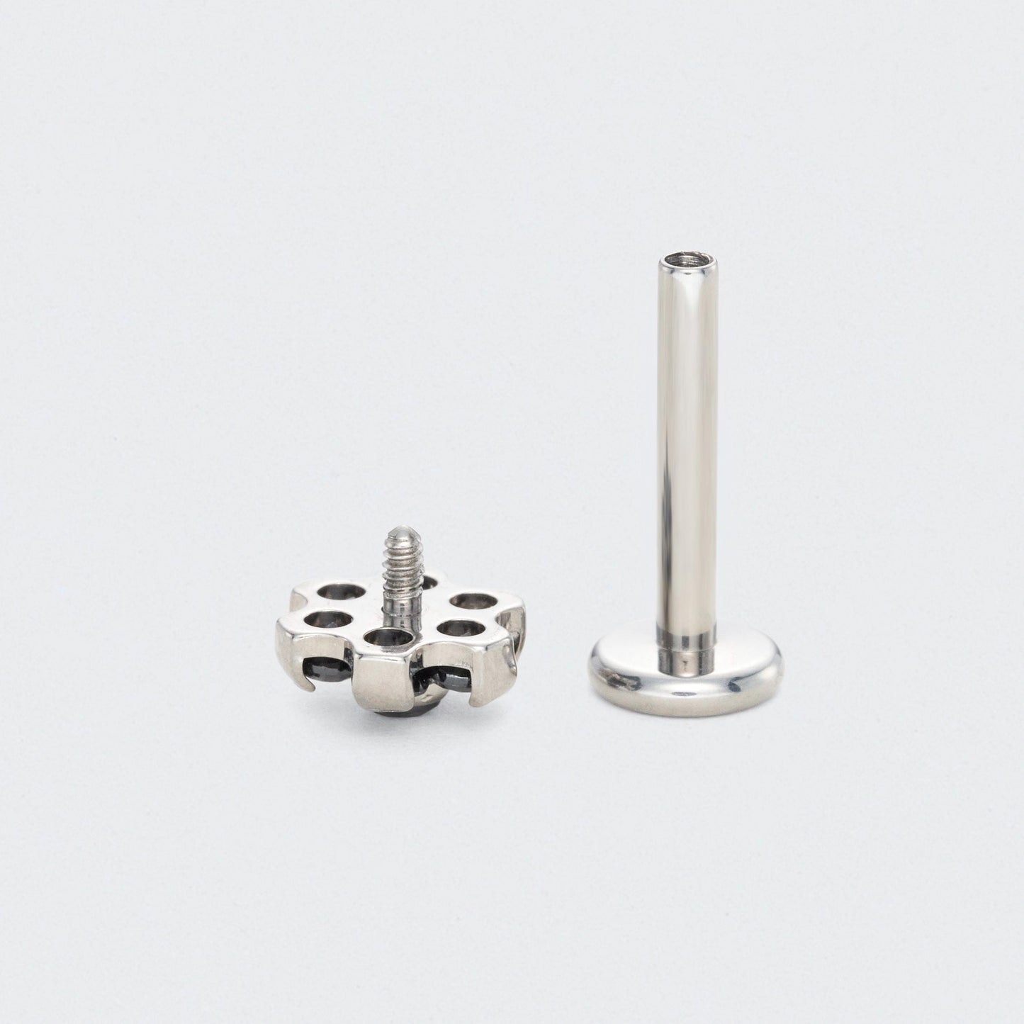 Bezel Flower Black CZ Labret in Silver - Titanium