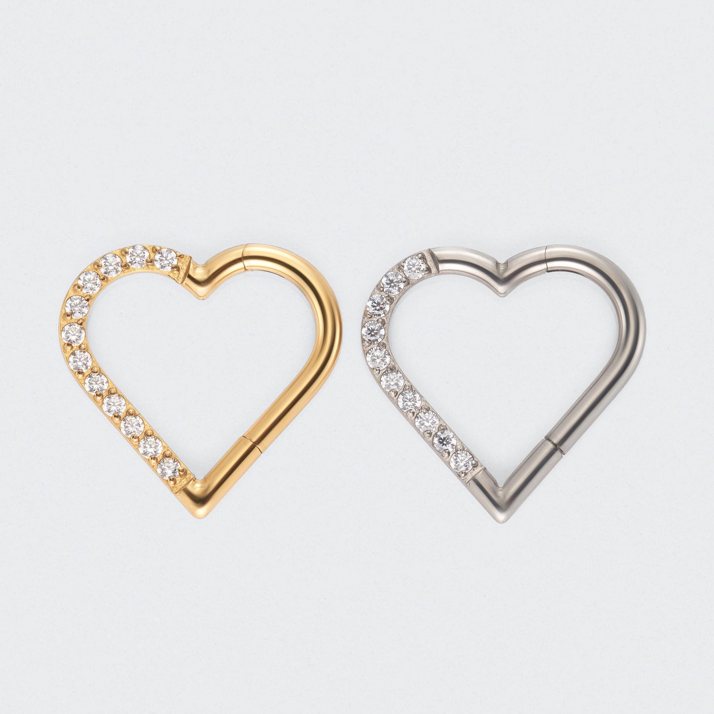 Heart Shaped with Left Facing CZ Segment Clicker Ring in Gold - Titanium