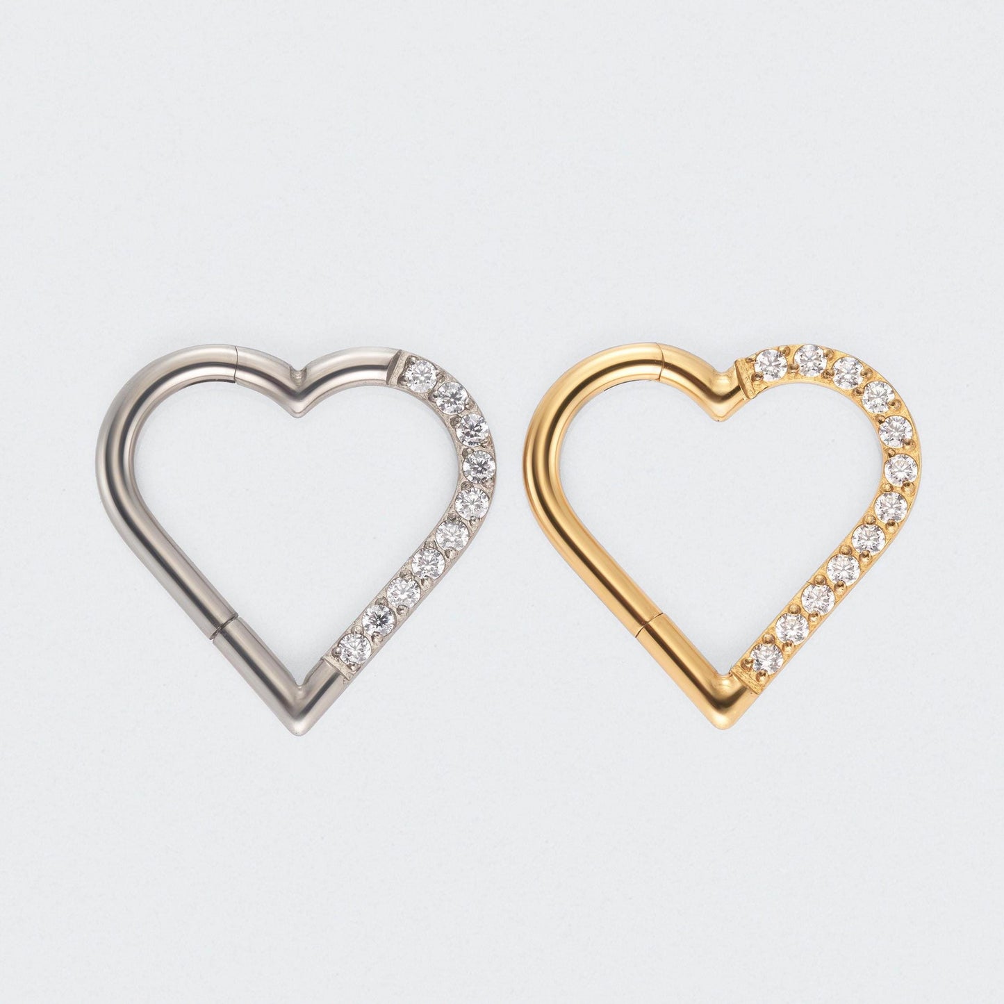 Heart Shaped with Right Facing CZ Segment Clicker Ring in Gold - Titanium