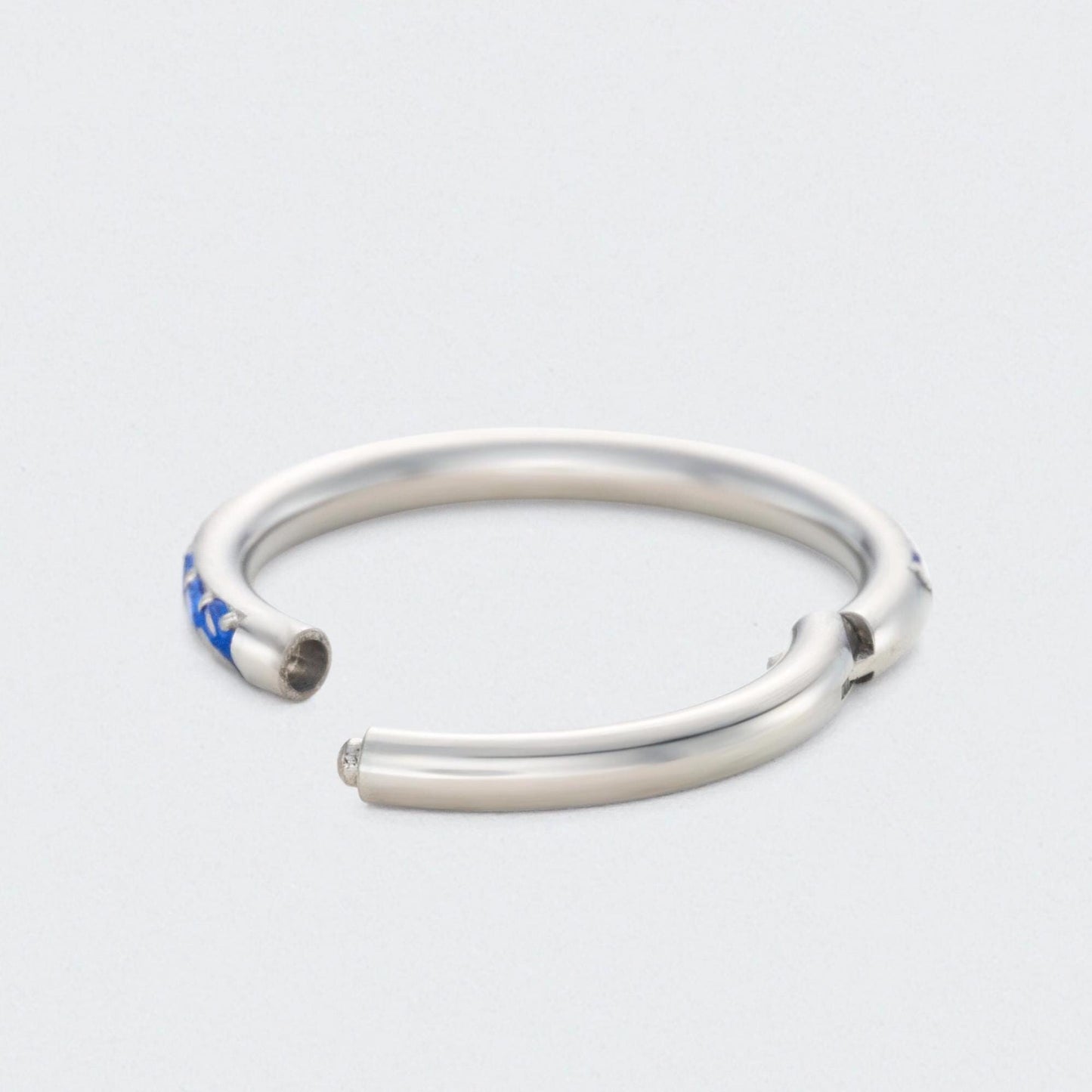 Blue CZ Side Facing Paved Hinged Segment Hoop Ring in Silver - Titanium