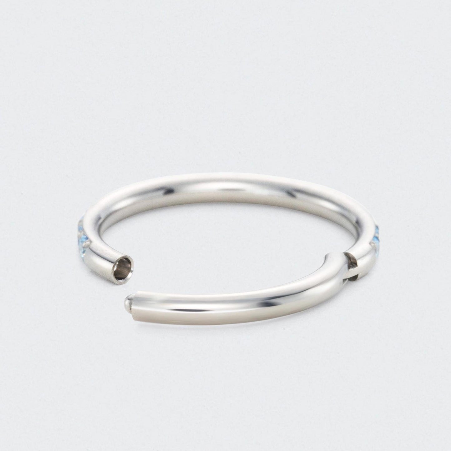 Aqua CZ Side Facing Paved Hinged Segment Hoop Ring in Silver - Titanium