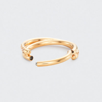 Twisted CZ Side Paved Hinged Segment Clicker Ring in Gold - Titanium