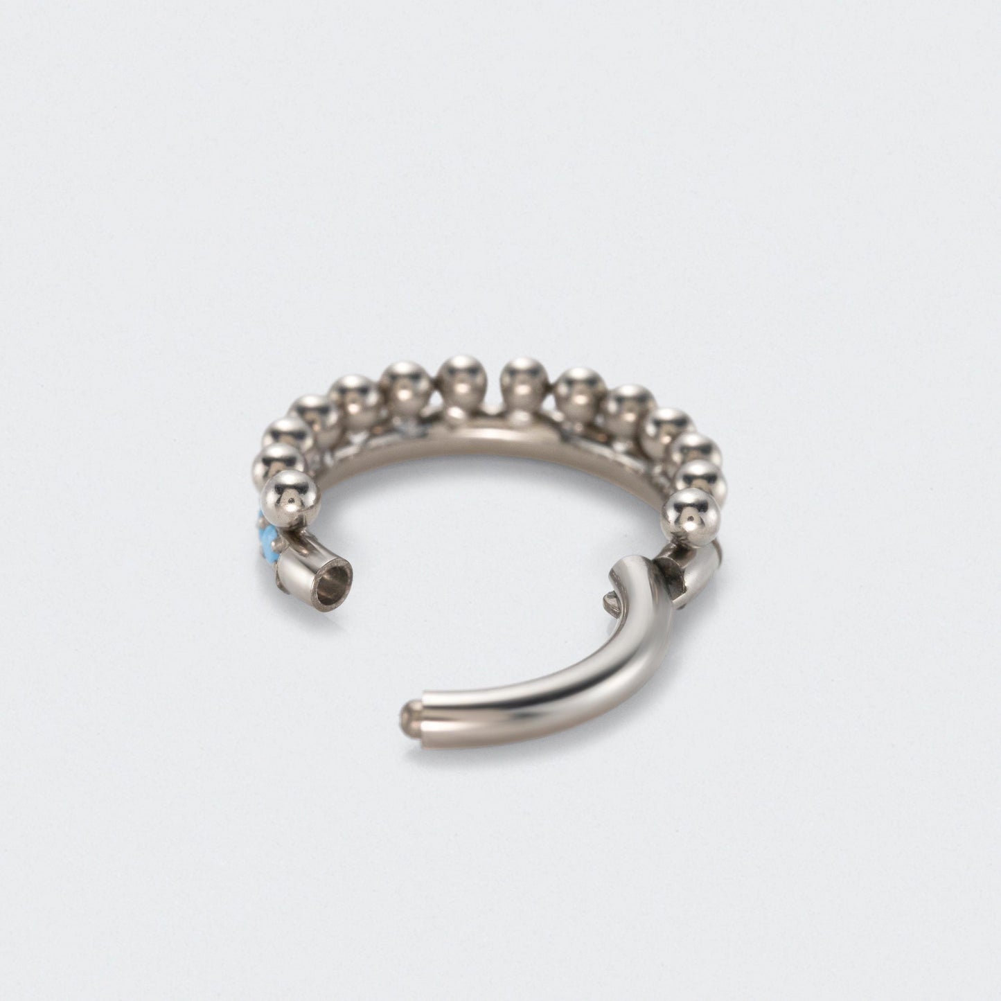 Turquoise Paved Side with Balls Weld Front Facing Segment Ring in Silver - Titanium