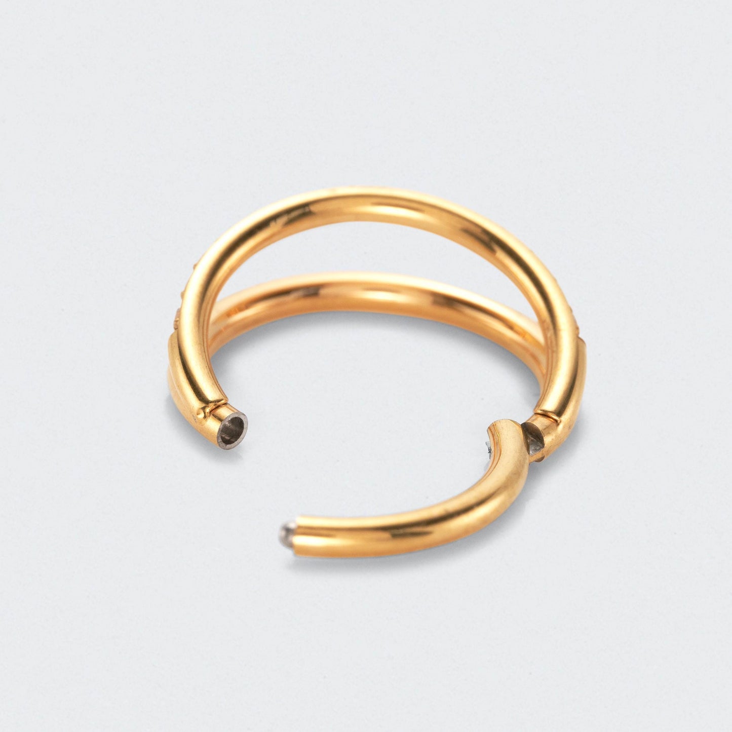Double Stacked Septum Ring with Front Facing CZ in Gold - Titanium