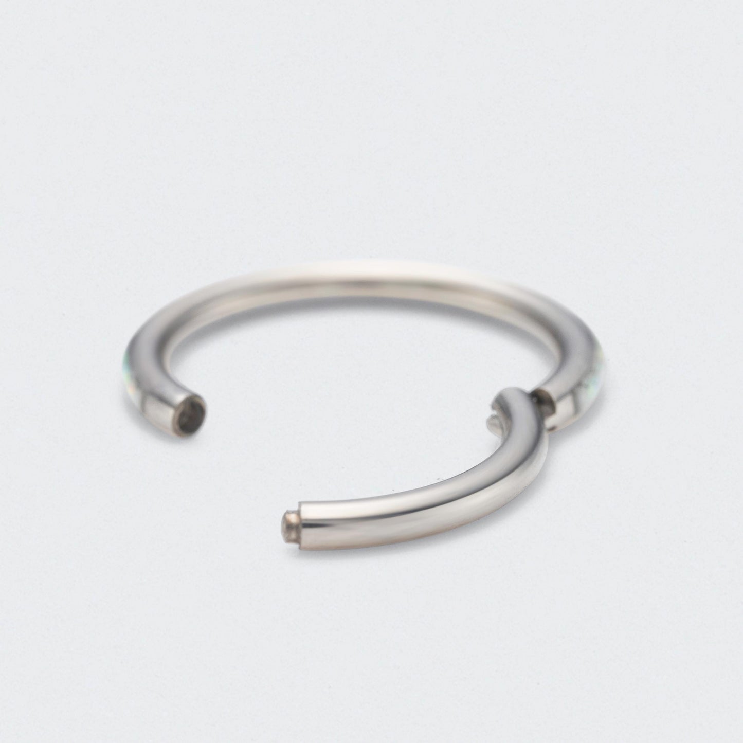 White Opal Side Facing Segment Hinged Clicker Ring in Silver - Titanium