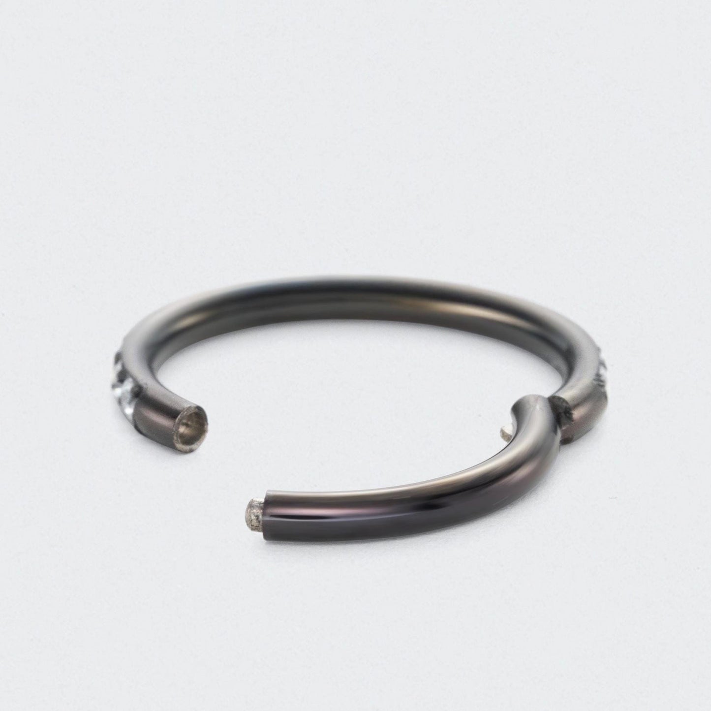 Clear CZ Side Paved Hinged Segment Hoop Ring in Black - Titanium