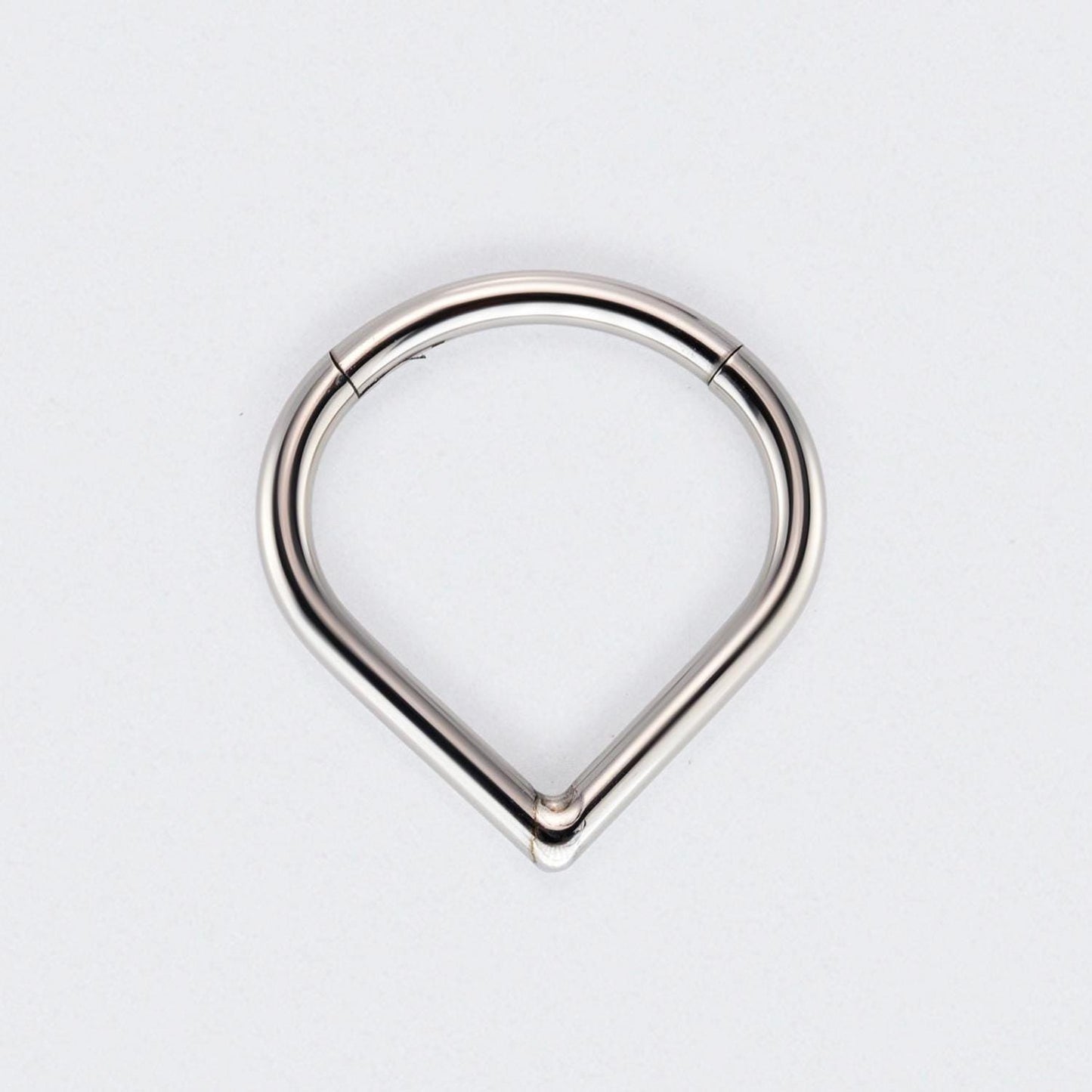 Hollow Heart Shaped Hinged Segment Clicker in Silver - Titanium
