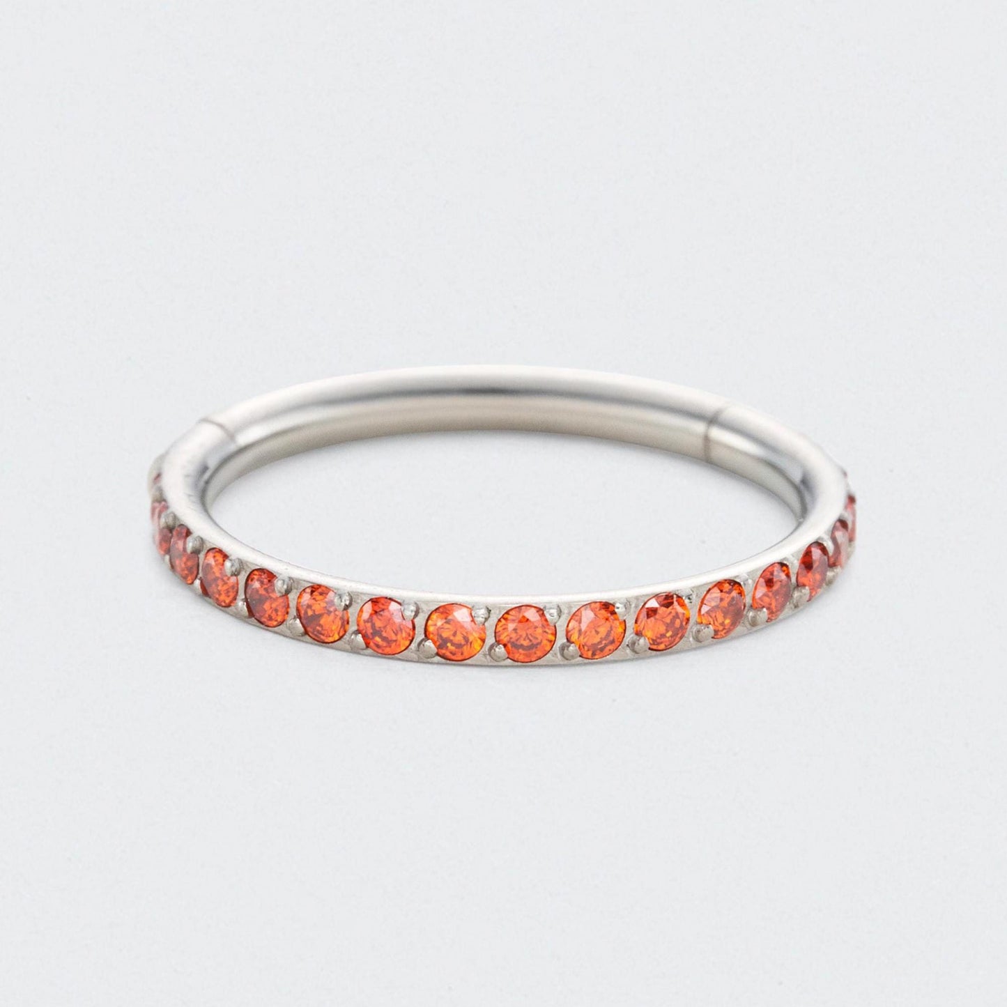 Red CZ Side Facing Paved Hinged Segment Hoop Ring in Silver - Titanium