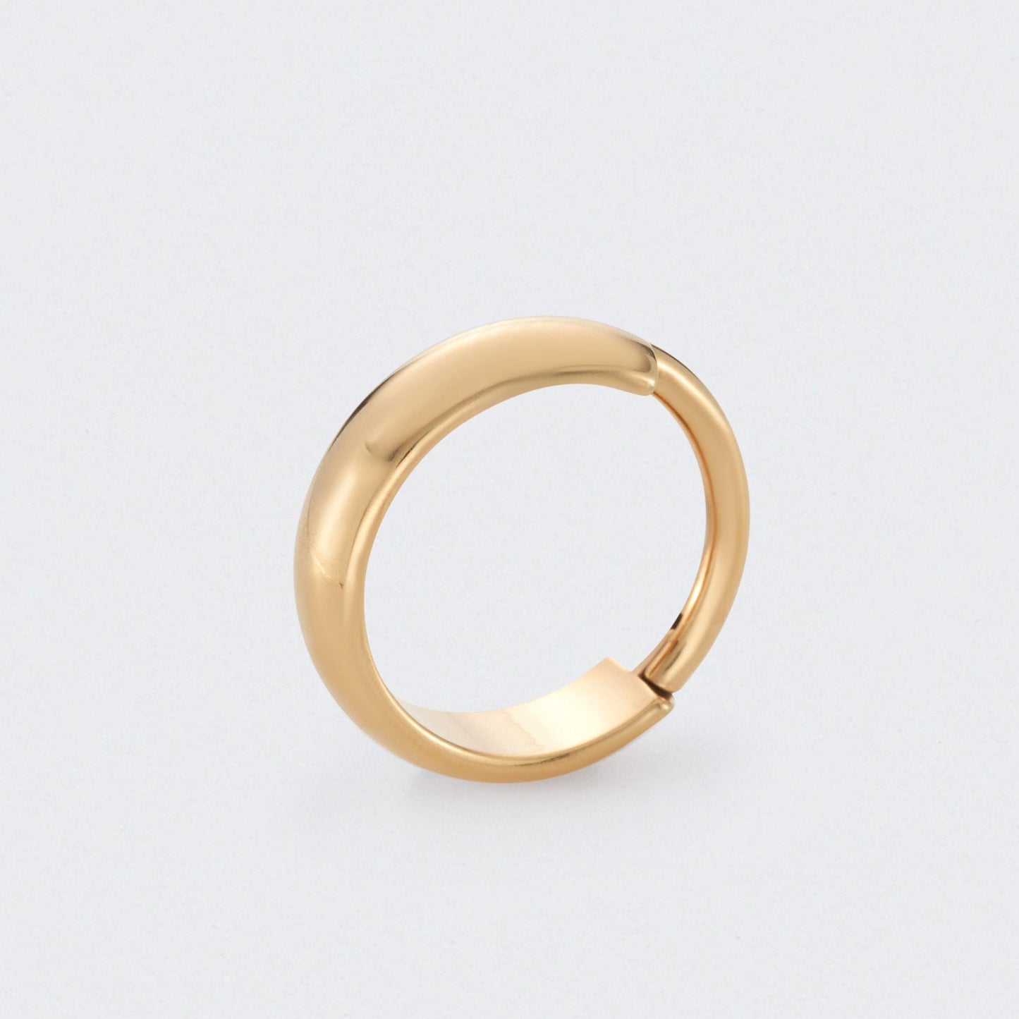 Huggie Hoop in Gold - Titanium